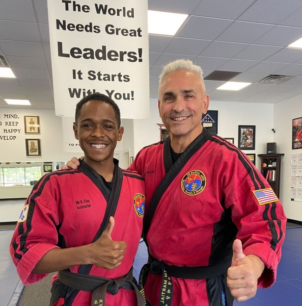 Timothy-Harrison-with-student