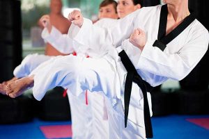 children in martial arts class showing focus and concentration performing a martial arts pose