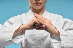 a child focusing on a meditative pose displaying one of the 4 laws of concentration